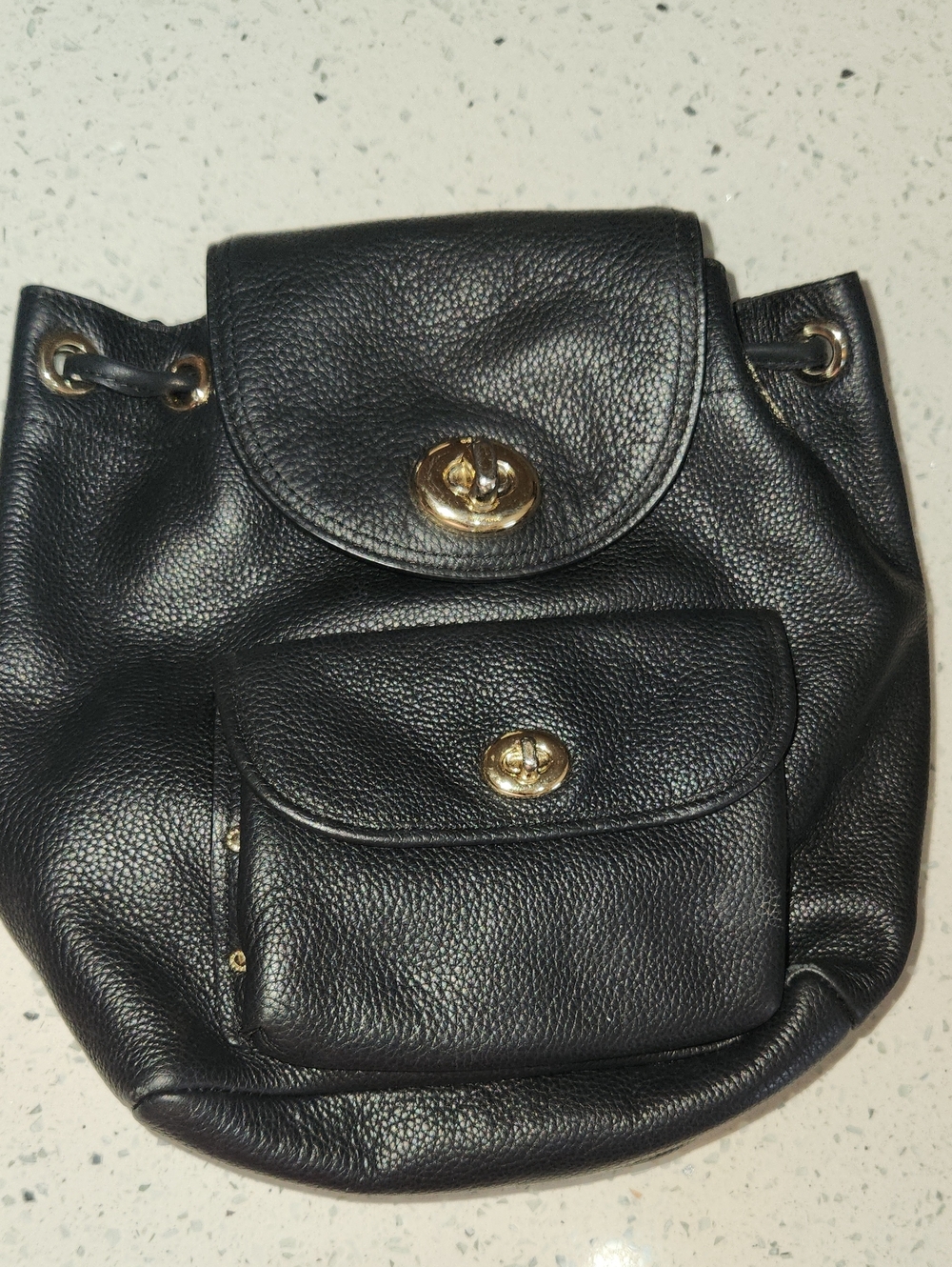 Coach Black Pebbled Leather Drawstring Backpack with Gold Hardware
